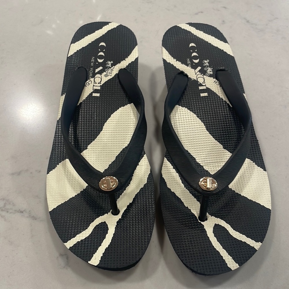 Women’s flip-flops by Coach size 7